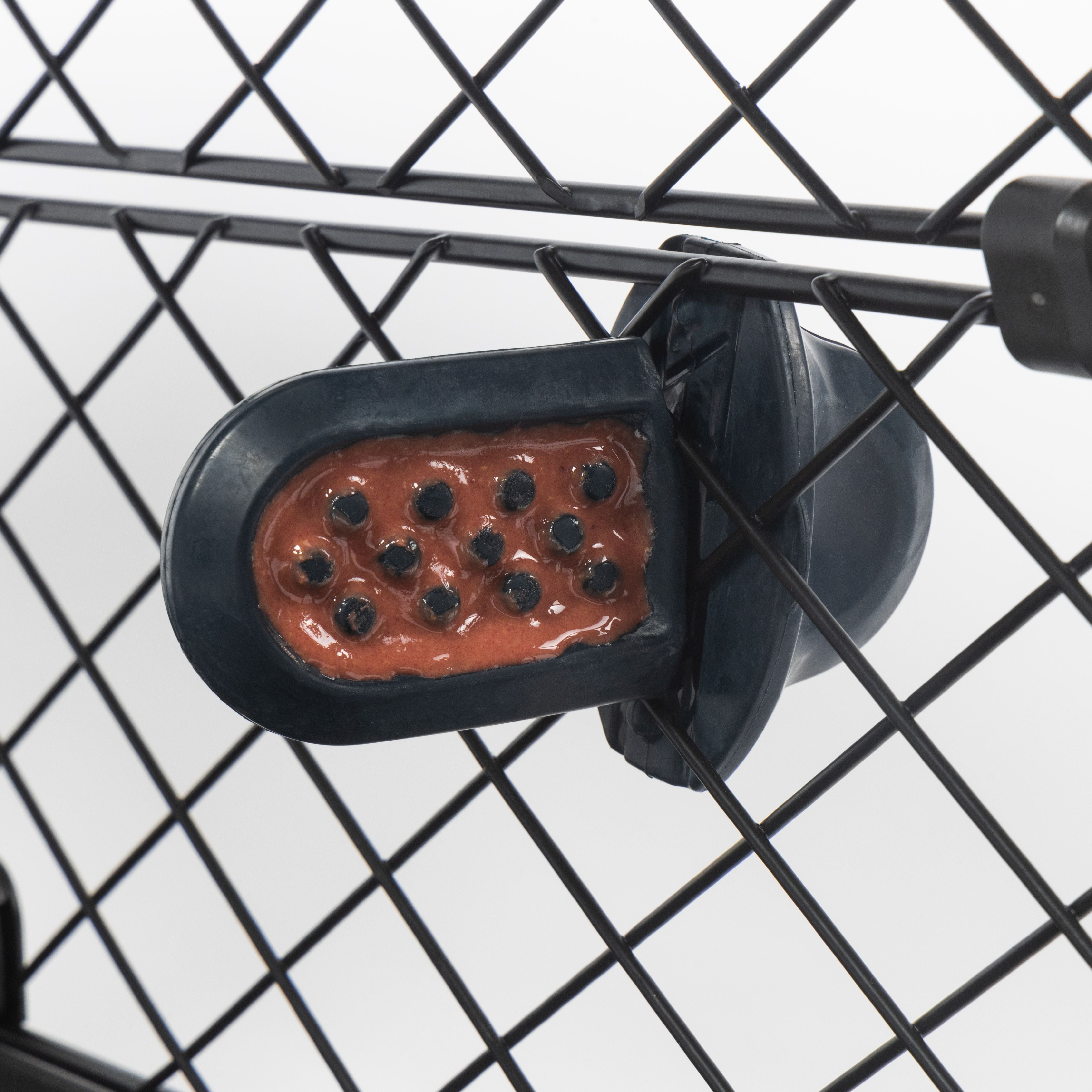 A training Groov is attached to the mesh of the Revol Crate.