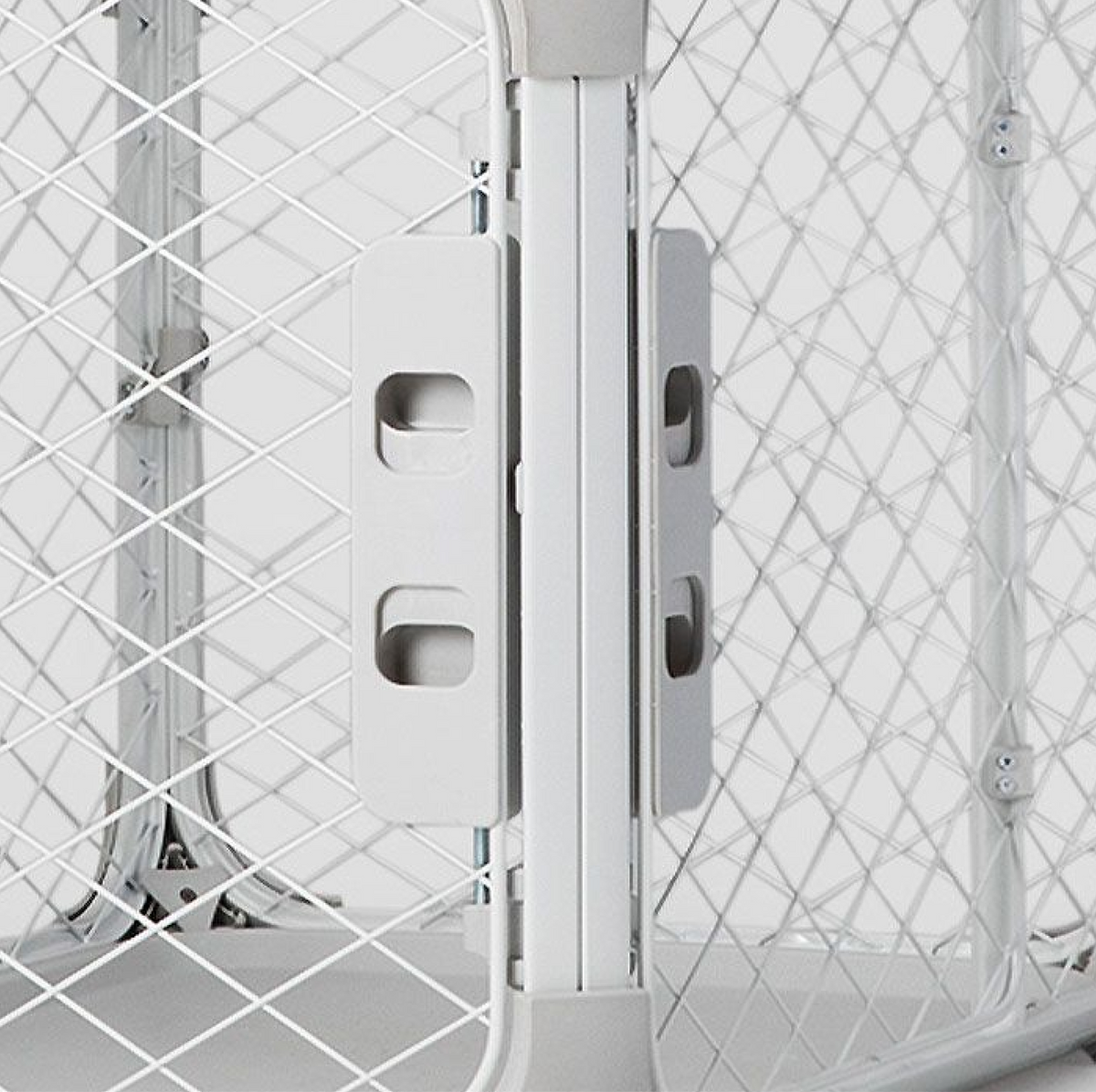 A close up of a white door with a metal handle