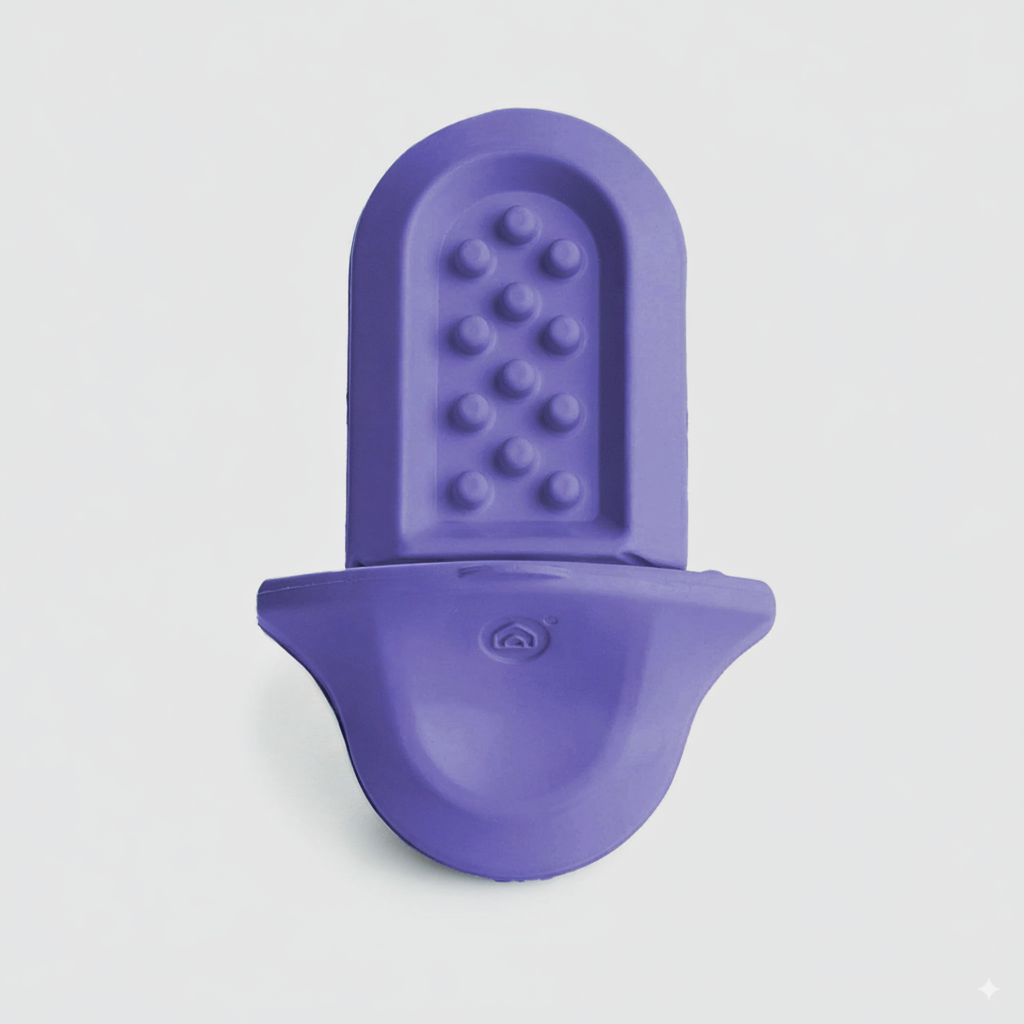 A lavender Groov training aid on a light grey background